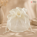 Translucent drawstring bag on a beige background with 'Bakeyy' branding.