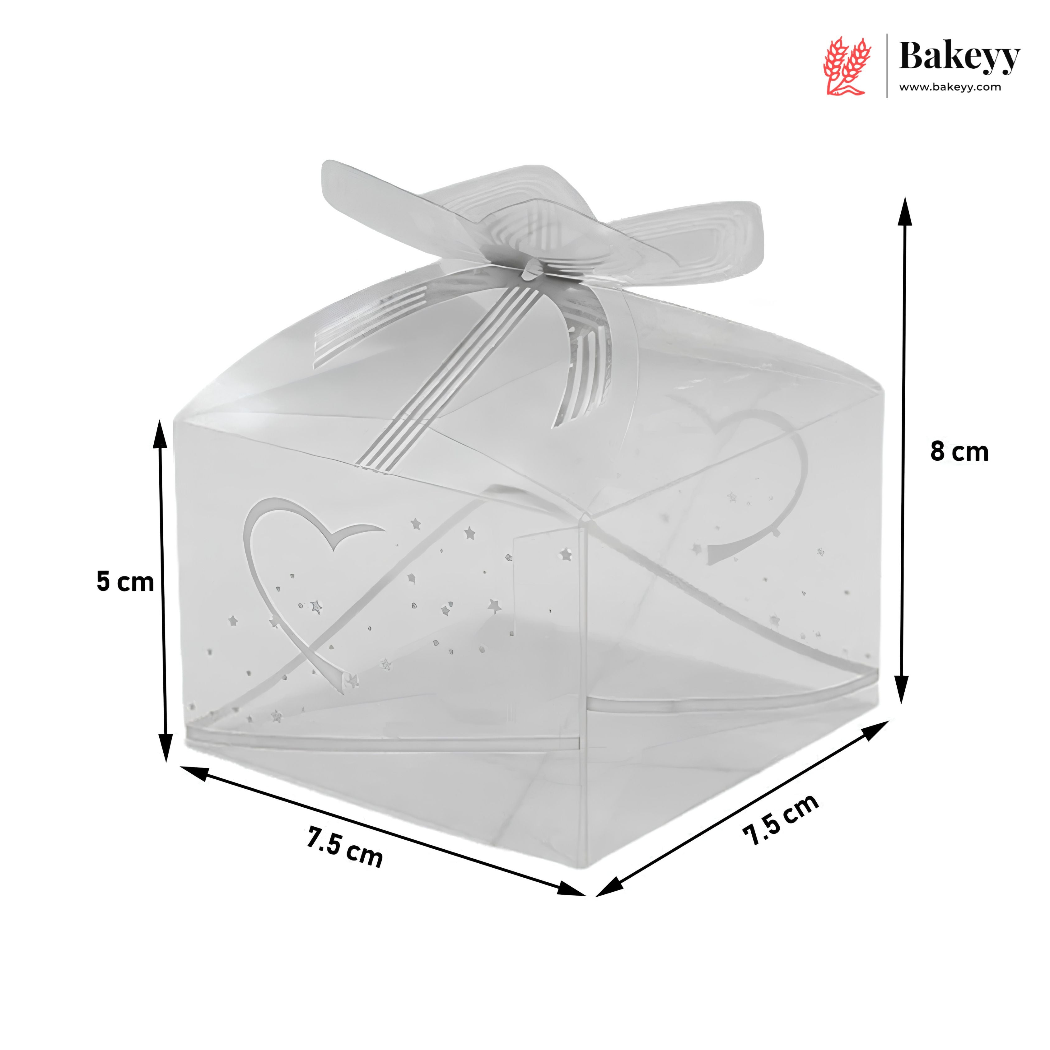 Clear cake box with heart design and dimensions labeled, featuring the Bakey brand.