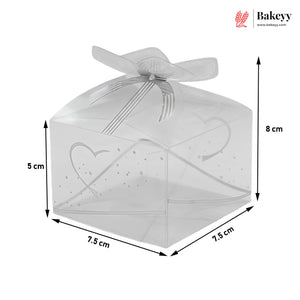 Clear cake box with heart design and dimensions labeled, featuring the Bakey brand.