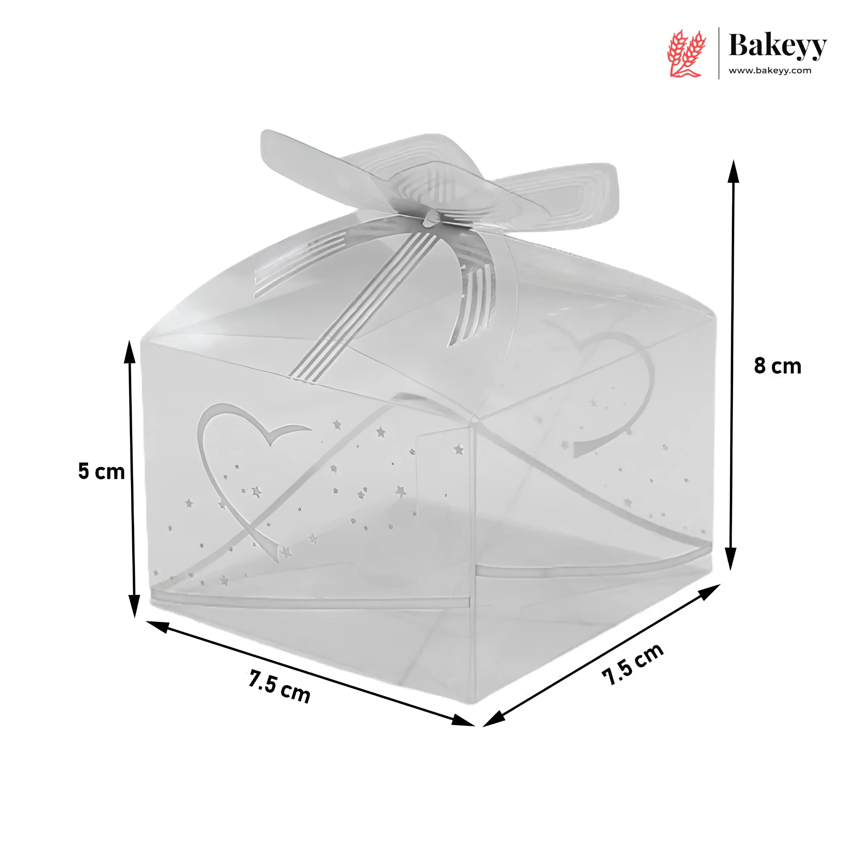 Clear cake box with heart design and dimensions labeled, featuring the Bakey brand.