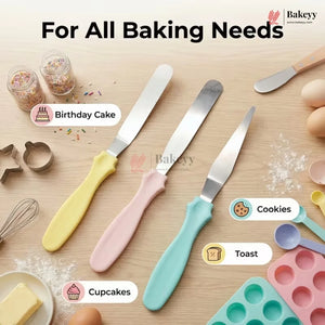 Set of baking tools with colorful handles on a wooden surface, featuring knives and a spatula.