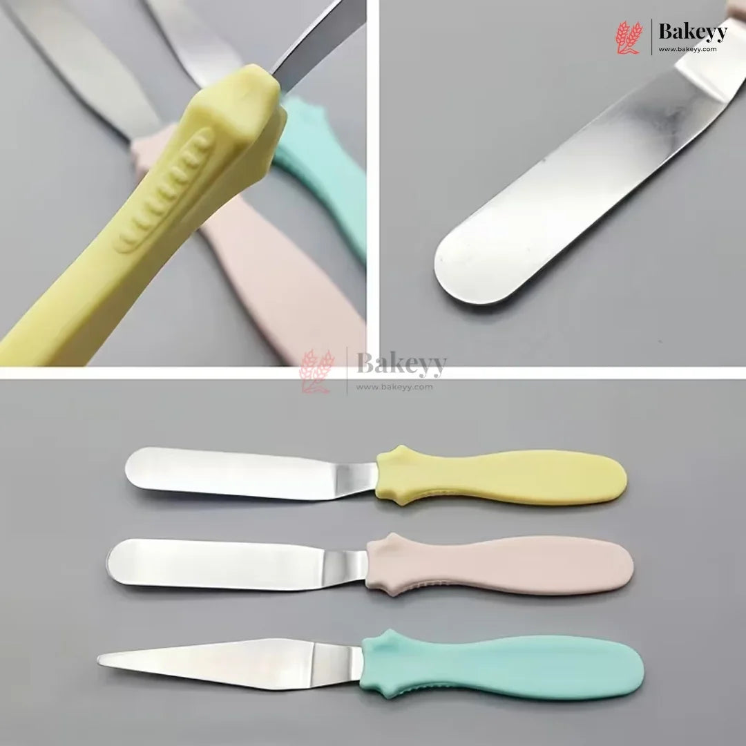 Set of four spatulas with different colored handles on a gray background, featuring the Bakey brand.