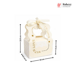 Candle in a decorative box with dimensions and Bakeyy branding