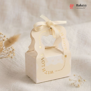 Beige gift box with ribbon and 'WITH LOVE' text on a soft beige background, featuring the brand 'Bakeyy'.