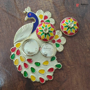 Decorative wall art with peacock design and colorful flowers on a wooden surface, branded 'Bakey'.