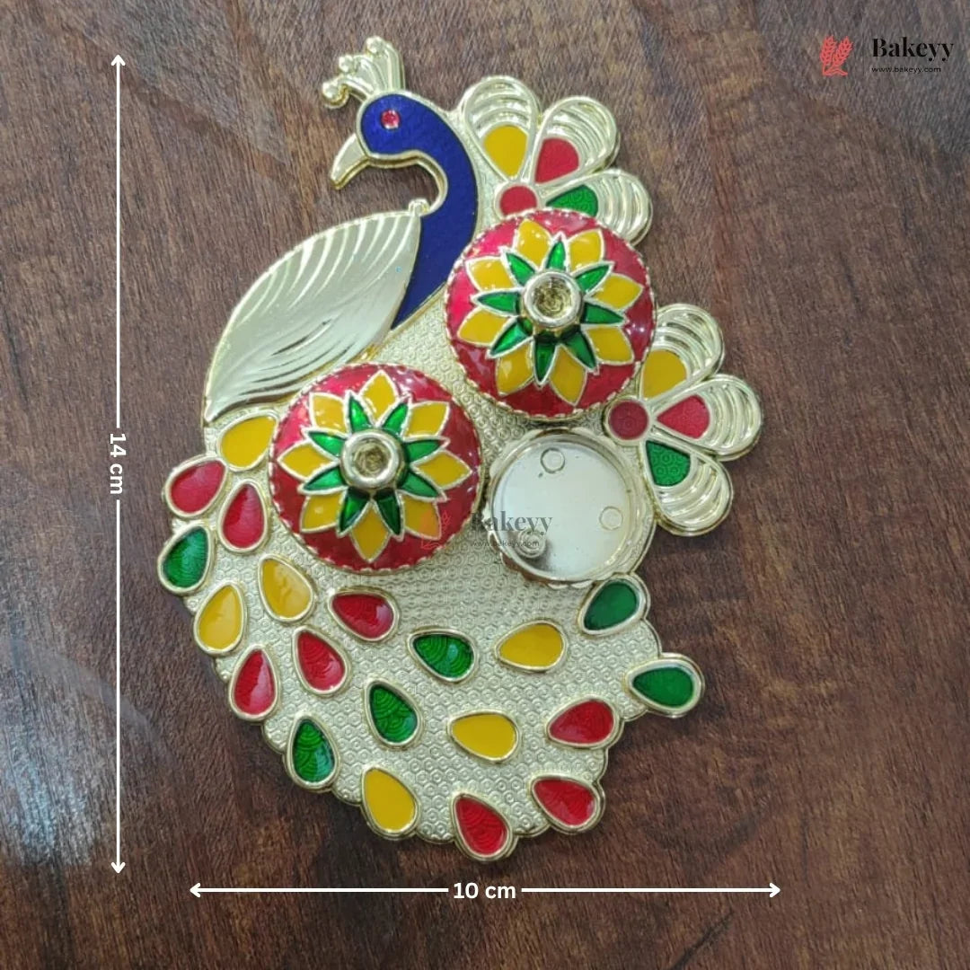 Decorative peacock-shaped object with colorful design on a wooden surface, featuring measurements.