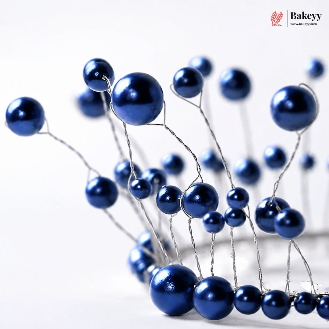 Blue decorative berries on a white background with 'Bakeyy' branding.