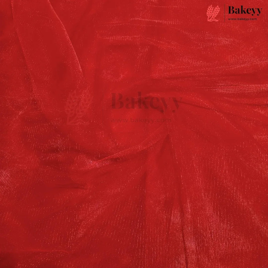 A close-up of bright red sheer mesh fabric with a textured, shimmering finish, swirled in the center. The Bakeyy brand logo is visible in the top right corner.