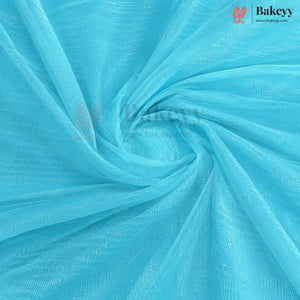 Light blue sheer mesh fabric draped in a spiral pattern, showing its fine woven texture. The Bakeyy brand logo is visible in the top right corner.