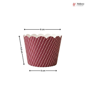 Red and white polka dot cupcake liner with measurements on a white background