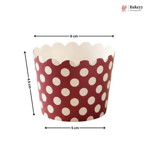 Red and white polka dot cupcake liner with measurements on a white background