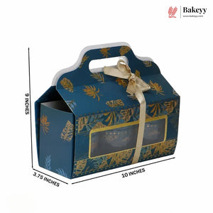 Blue gift box with gold leaf pattern and handle, featuring dimensions and Bakeyy branding.