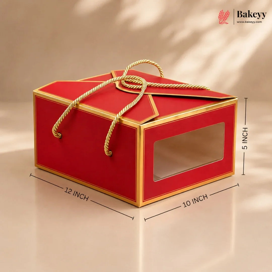 Red and gold cake box with dimensions on a beige background, featuring the Bakeyy brand.