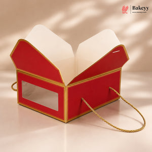 Red and gold box with an open lid on a beige background, featuring the Bakey brand.