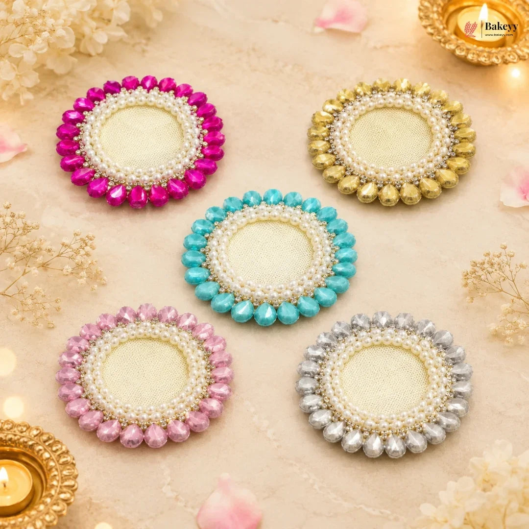 Decorative coasters with colorful bead patterns on a soft beige background.