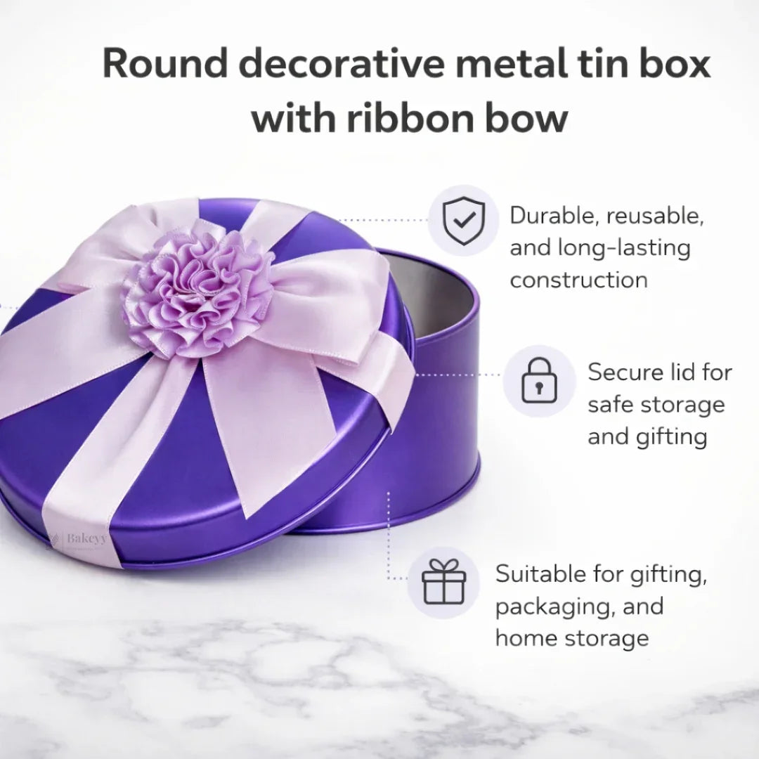 Purple round metal tin box with decorative ribbon bow, ideal for gifting and packaging from Bakeyy.