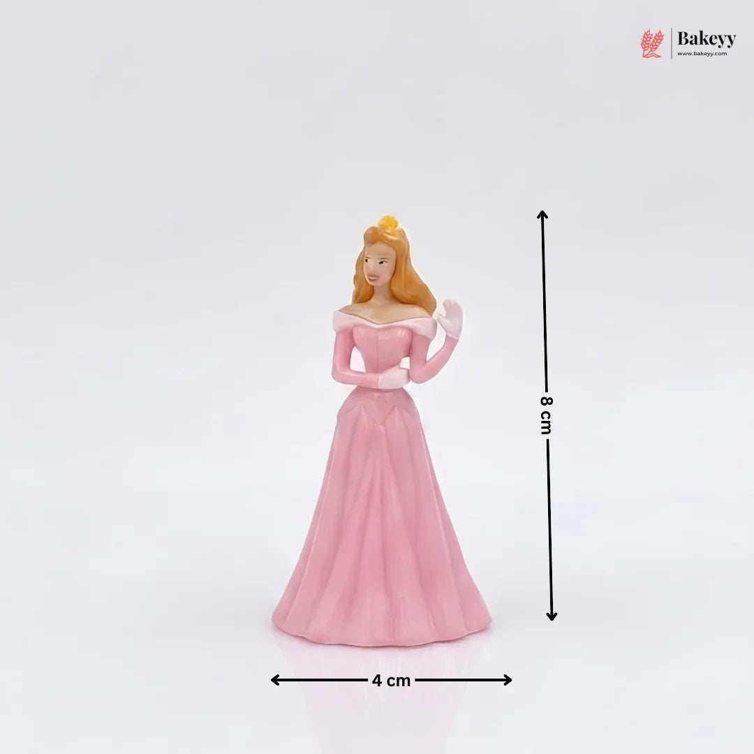 Princess figurine in a pink dress with measurements on a white background, featuring the Bakey brand.
