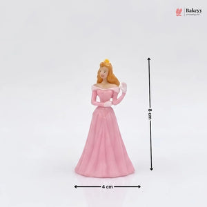 Princess figurine in a pink dress with measurements on a white background, featuring the Bakey brand.