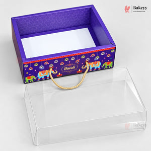 A purple Diwali-themed gift box with colorful elephant illustrations and a gold rope handle, shown next to a clear acrylic display box on a light gray background. The Bakeey logo is visible in the top right corner.