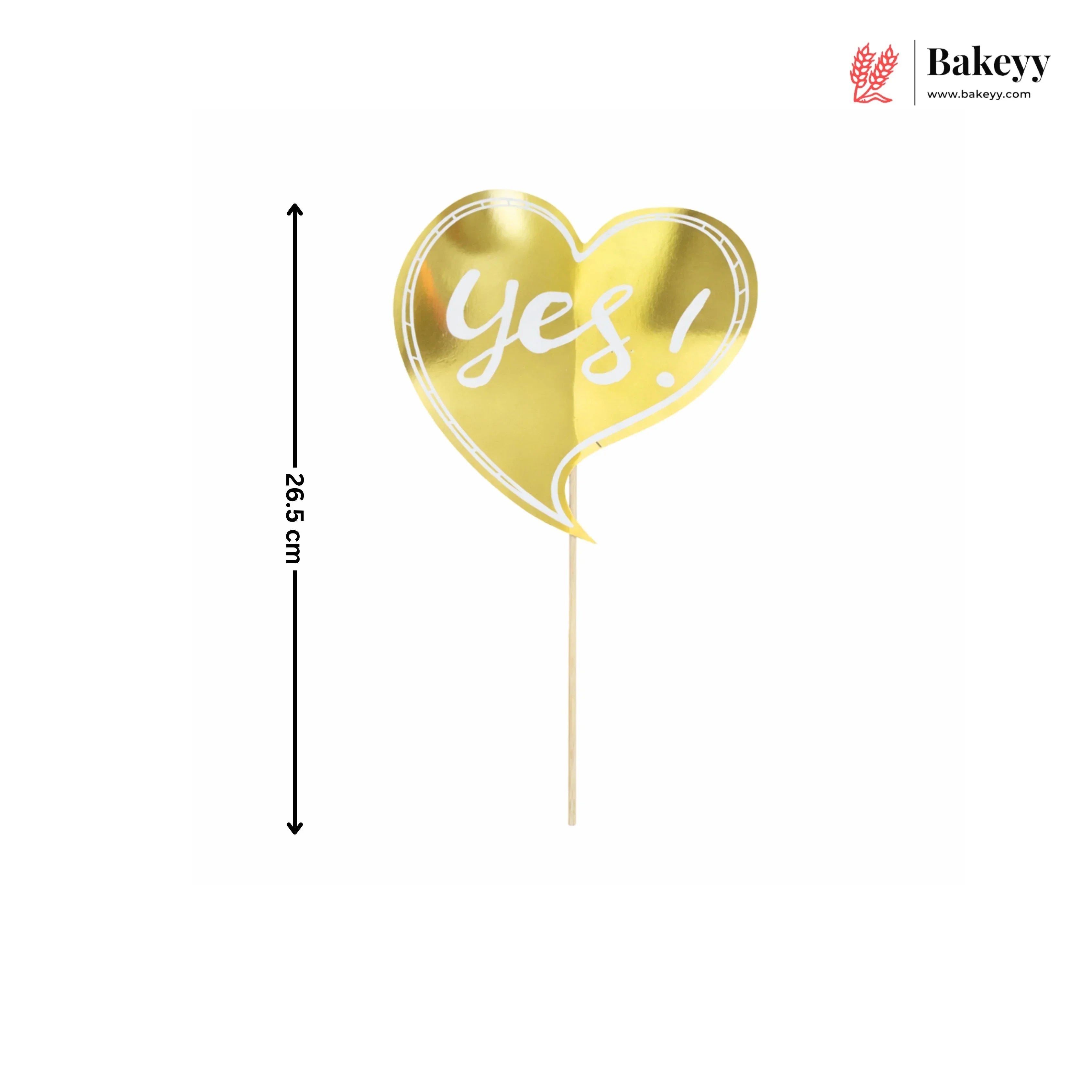 Gold heart-shaped balloon with 'Yes!' text on a white background, featuring Bakeyy branding.