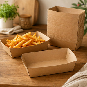 Kraft paper food containers with fries on a wooden surface
