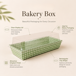 Green gingham bakery box with clear lid on a beige background