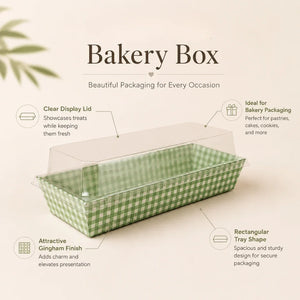 Green gingham bakery box with clear lid on a beige background