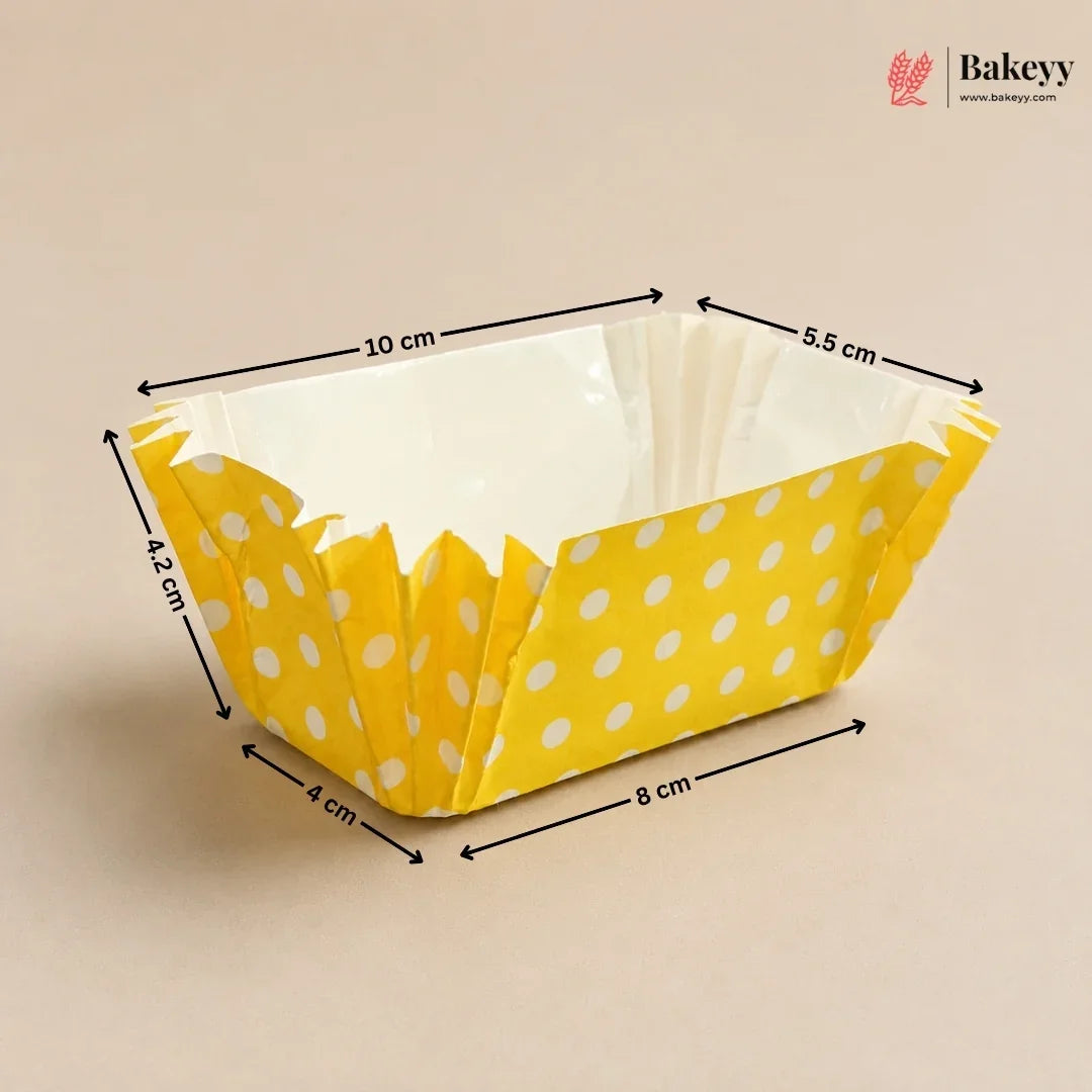 Yellow polka dot paper basket with dimensions on a beige background, featuring the Bakey brand.