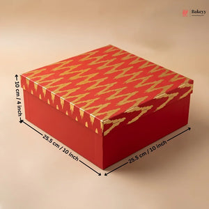 Red gift box with gold patterns and dimensions on a beige background