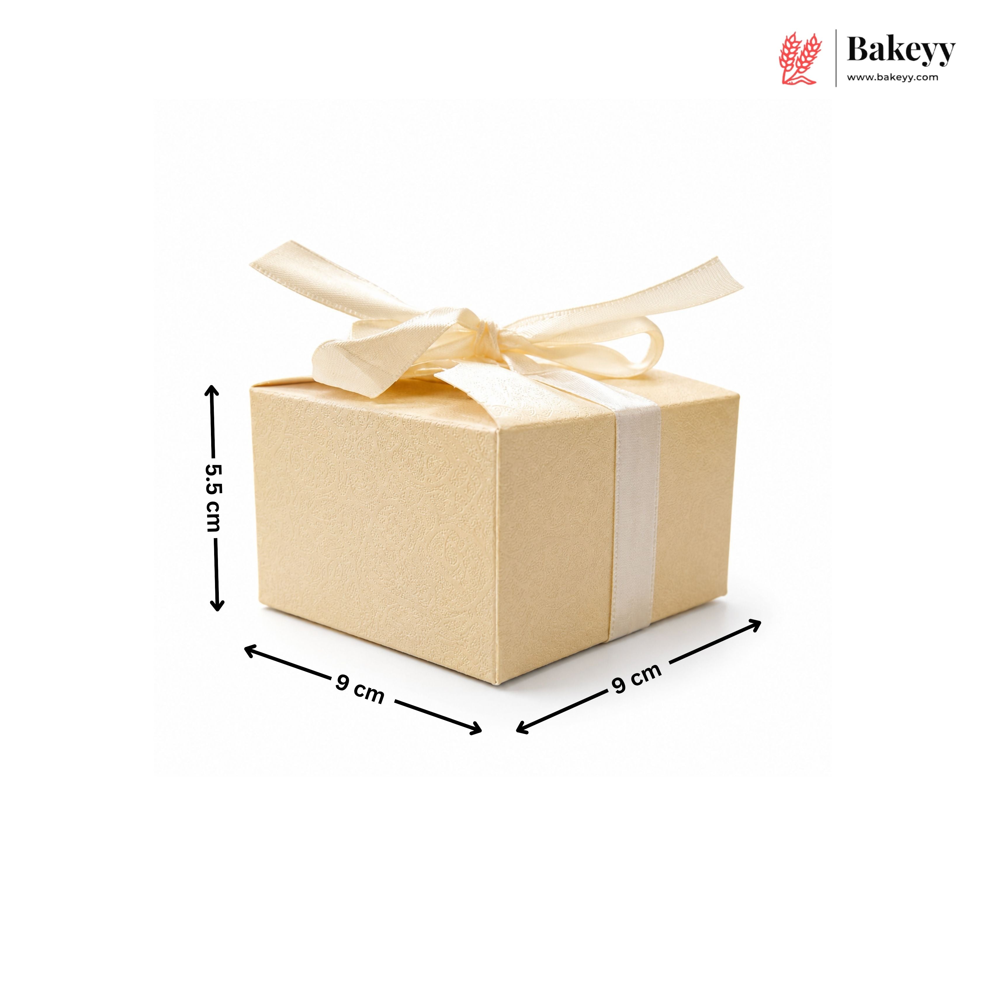 Gift box with a ribbon and dimensions on a white background, featuring the Bakeyy brand.
