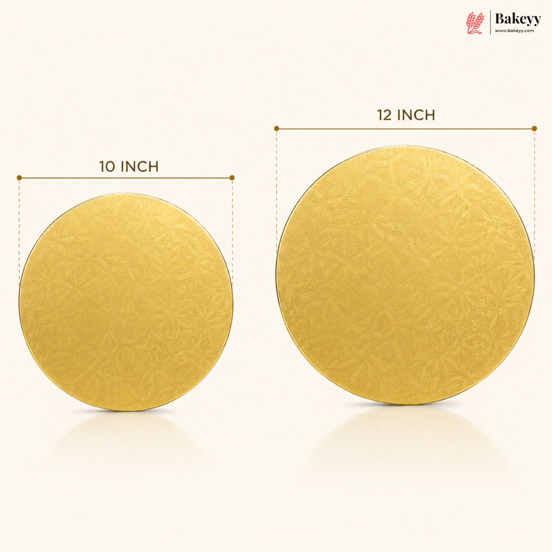 Two round gold cake boards with measurements on a white background, featuring the Bakeyy brand.