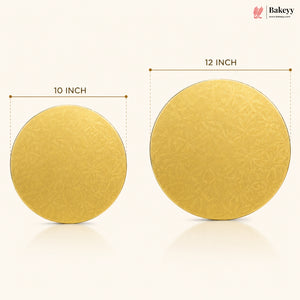 Two round gold cake boards with measurements on a white background, featuring the Bakeyy brand.