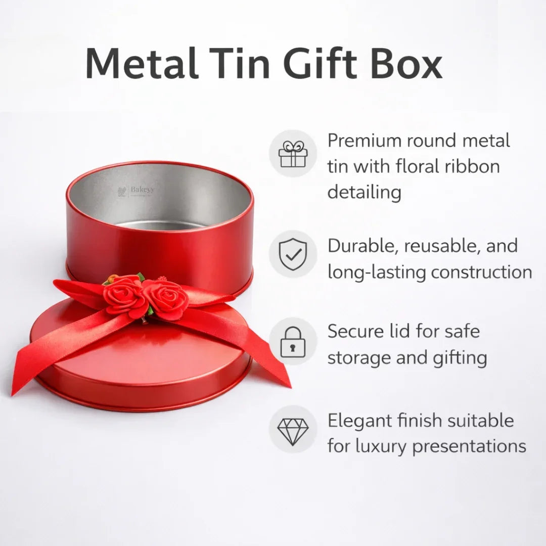 Round red metal tin gift box with floral ribbon, ideal for gift packaging from Bakeyy.com