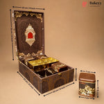 An ornate dark brown decorative storage box with gold detailing, shown open with smaller matching boxes inside. Black dimension arrows and labels indicate the measurements of the box and a separate matching container on a plain beige background.