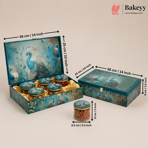 Decorative blue peacock-themed gift box set with six small jars, shown open and closed with printed dimensions in centimeters and inches. A single jar is placed in front.