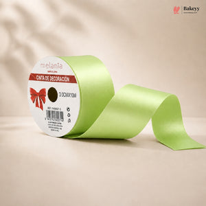 Green ribbon with a white label on a beige background