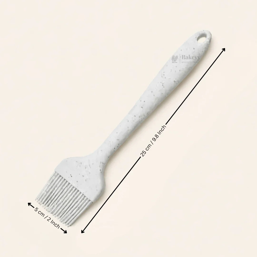 White silicone baking brush 25cm, 5cm wide, ideal for pastry and bakery use from Bakeyy.com