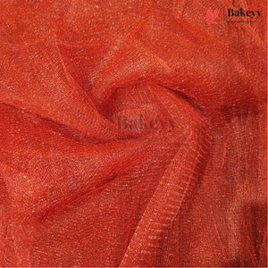 A close-up of draped red-orange sheer mesh fabric with a subtle shimmer, showing its texture and color. A semi-transparent 'Bakeyy' watermark is visible across the center, and a logo for 'Bakeyy Color Studio' appears in the top right corner.