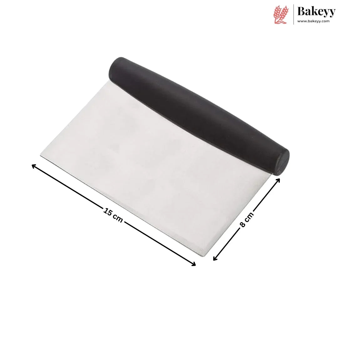 A metal pastry scraper with a black handle, shown on a white background with black dimension arrows indicating 15 cm length and 8 cm width. A Bakeyy logo is visible in the top right corner.