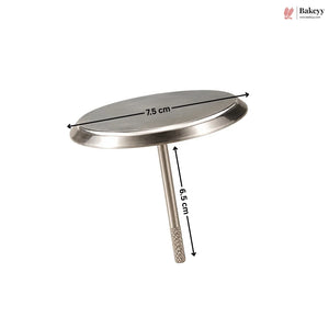 A stainless steel round cake topper with a stem, shown with dimension lines indicating a top diameter of 7.5 cm and a stem height of 6.