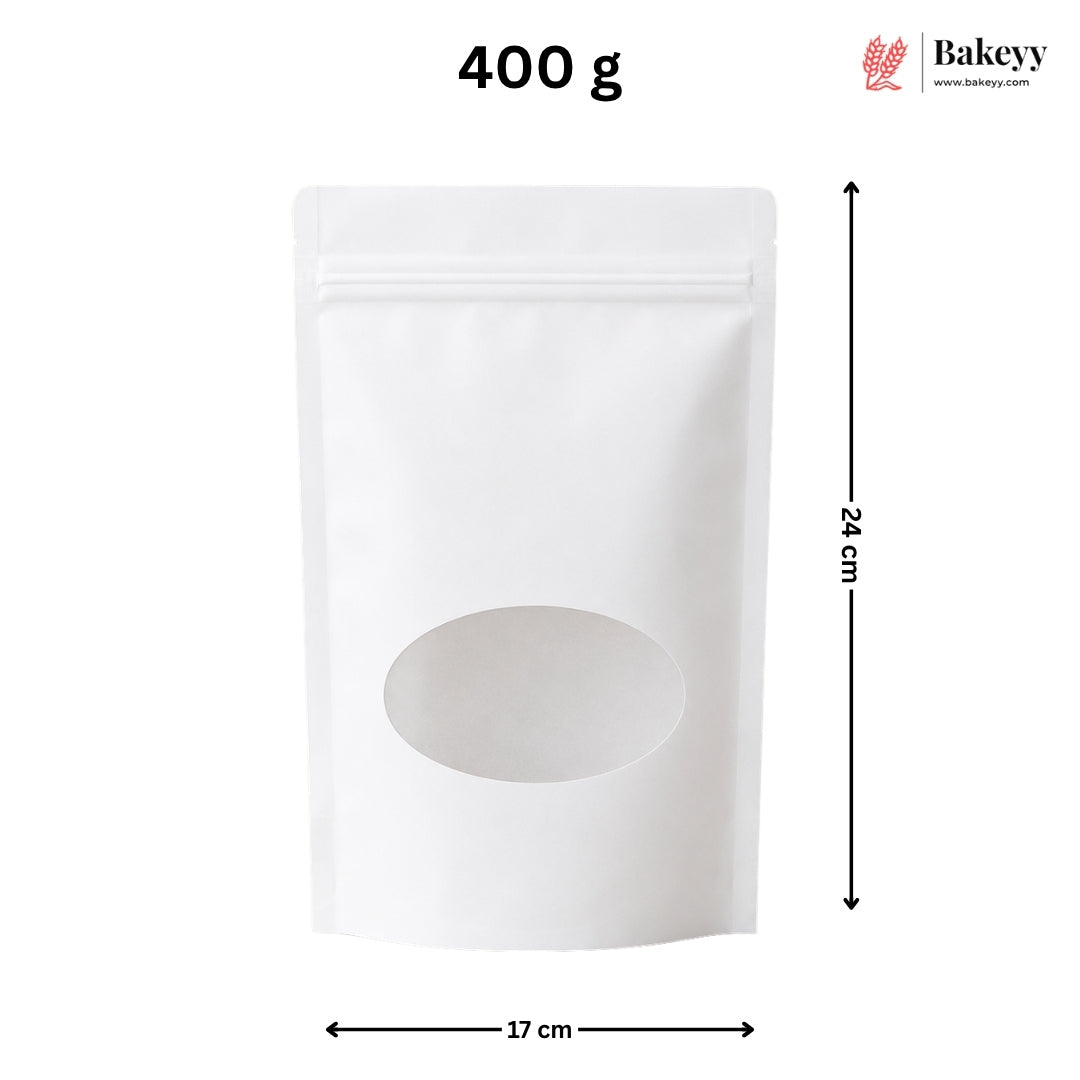 White stand-up pouch packaging with a die-cut oval window, shown with dimension arrows labeled 24 cm tall and 17 cm wide, plus '400 g' text and a Bakeey logo in the top right.