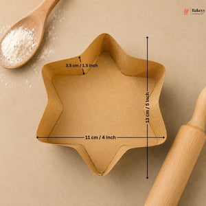 Star-shaped cookie cutter with measurements on a beige background, surrounded by flour and a rolling pin.