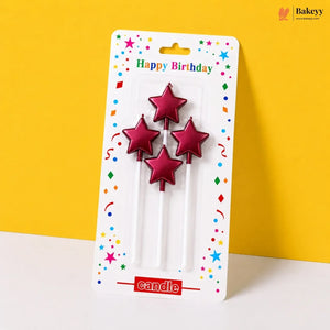 Star-shaped birthday candles in packaging with a yellow background