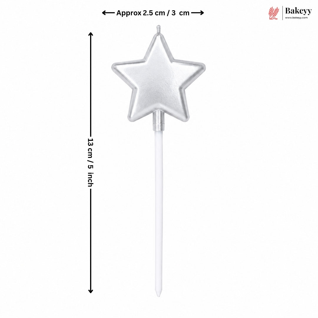 Star-shaped cake topper with dimensions on a white background