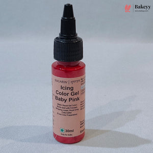A 30ml bottle of Sugarin Icing Color Gel in the shade Baby Pink, featuring a black cap and a light pink label, set against a neutral light gray background.