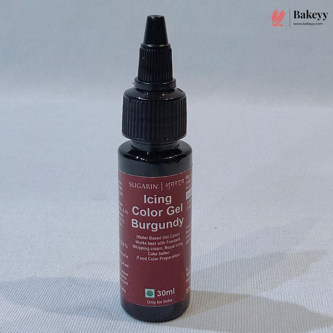 A 30ml bottle of SUGARIN Icing Color Gel in Burgundy, featuring a black plastic dropper cap and a dark red label, set against a light gray textured background.