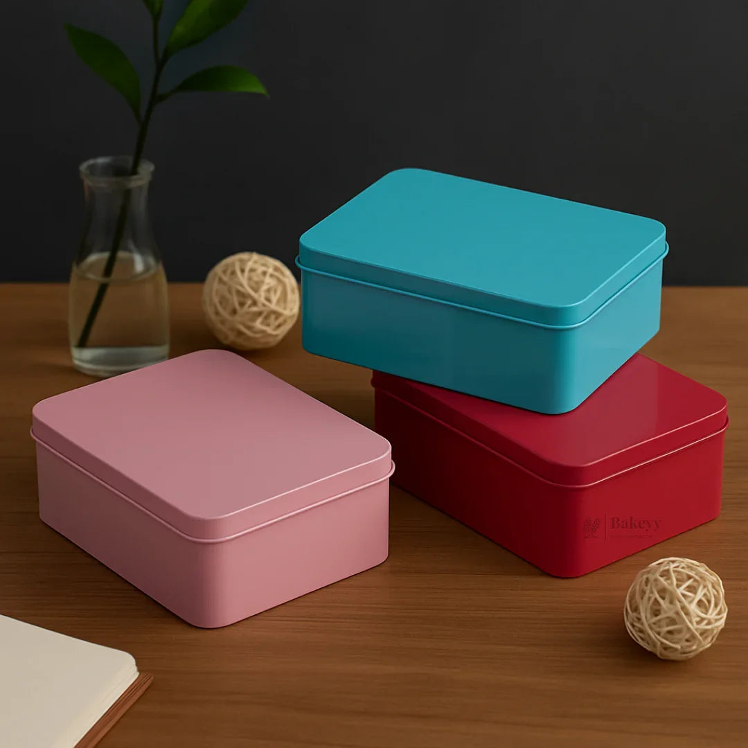 Colorful rectangular tin boxes for bakery gift packaging on wooden table, Bakeyy wholesale supplies