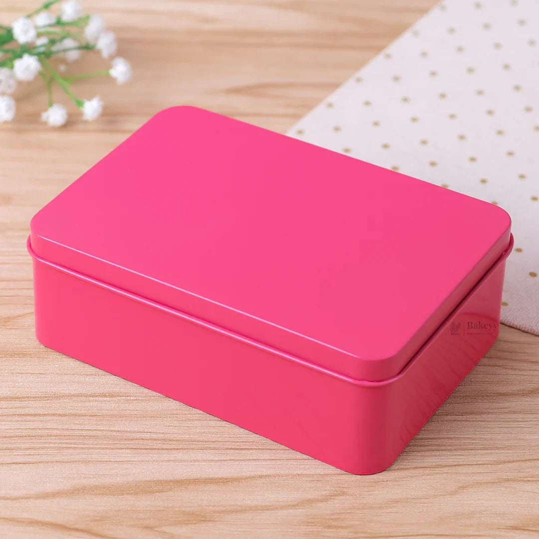 Pink rectangular tin box for bakery gift packaging on wooden table from Bakeyy.com