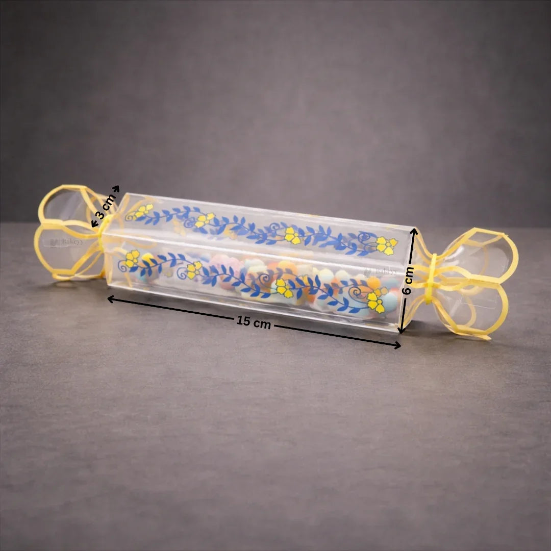 Clear transparent box with decorative floral print
Candy-style shape with twisted ends for a gift-ready look
Ideal for chocolates, candies, toffees, small treats, and favors
Great for birthdays, weddings, baby showers, festive gifting, and hampers
Lightweight, neat presentation, easy to display