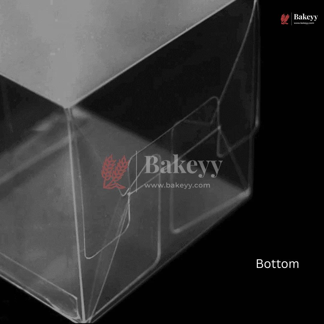 Clear plastic box with 'Bakeyy' branding on a black background